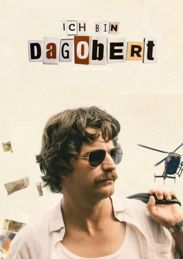 Ein Mann mit Sonnenbrille und Schnurrbart vor einem Hubschrauber, im Hintergrund der Titel „Ich bin Dagobert“.