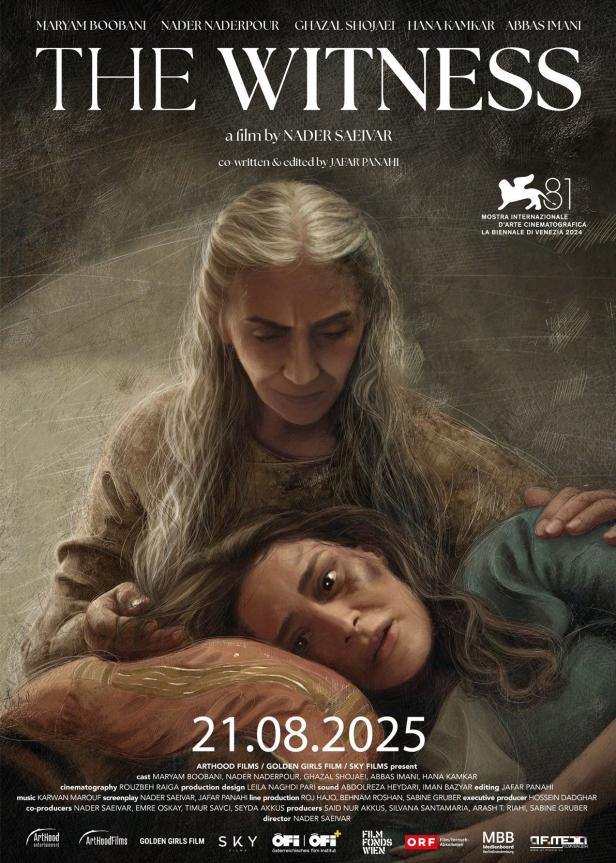 Das Filmplakat für „The Witness“ zeigt zwei Frauen, eine ältere und eine jüngere, in einer innigen Umarmung.