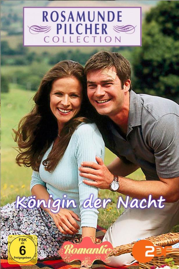 Das Cover des Rosamunde Pilcher Films „Königin der Nacht“ zeigt ein lächelndes Paar bei einem Picknick.
