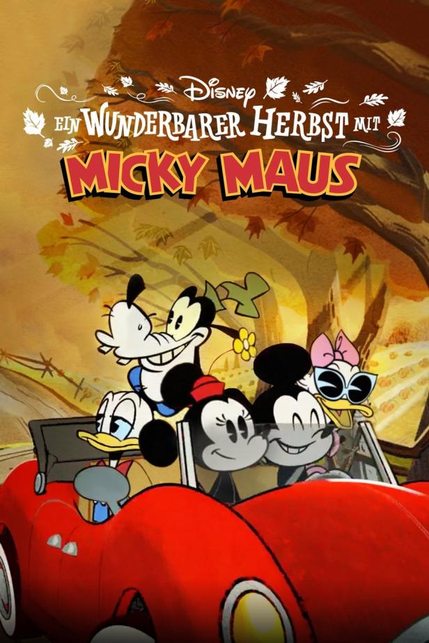 Micky Maus, Minnie Maus, Goofy und Donald Duck fahren in einem roten Auto durch einen herbstlichen Wald.