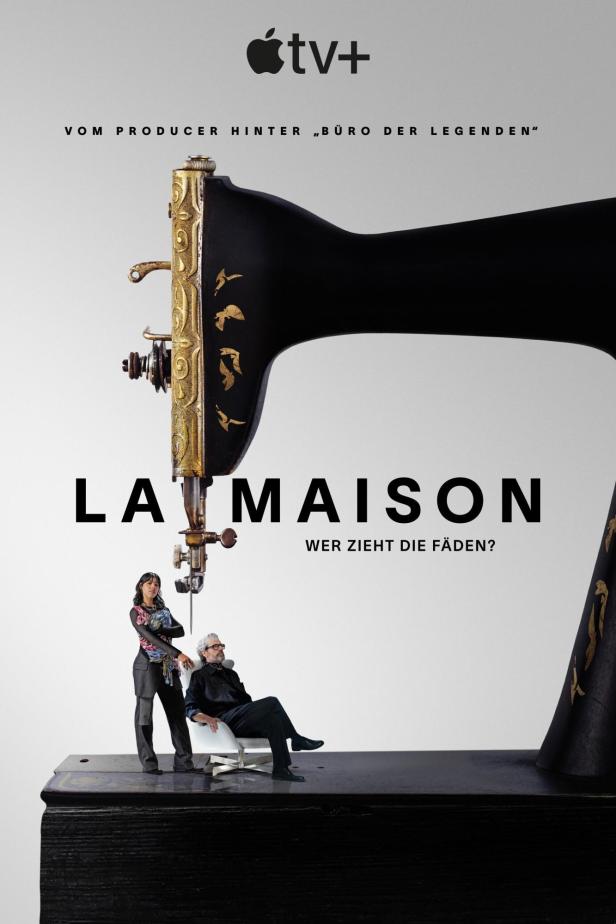Das Poster für „La Maison“ zeigt eine Nähmaschine, auf der zwei Personen sitzen.