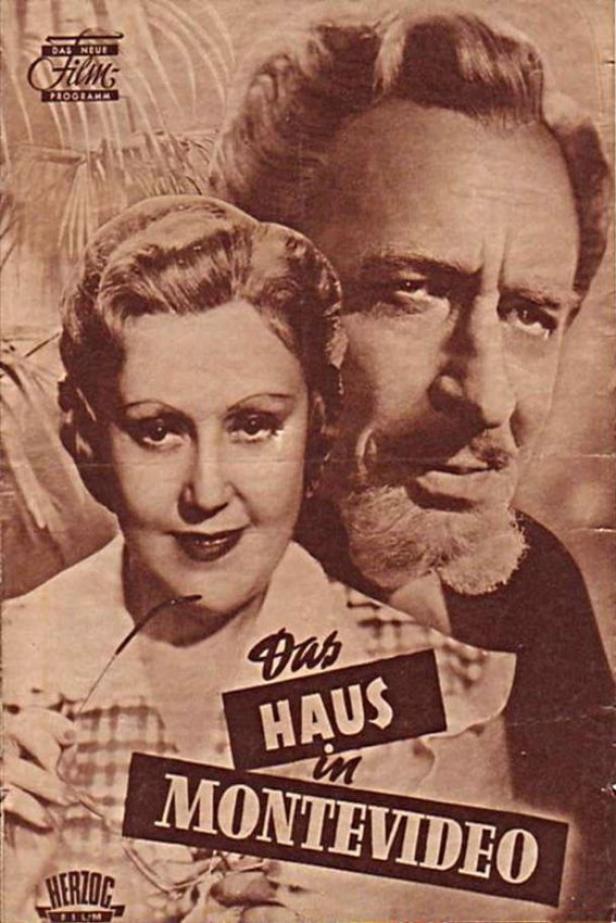 Ein Filmposter für „Das Haus in Montevideo“ mit einer Frau und einem Mann.