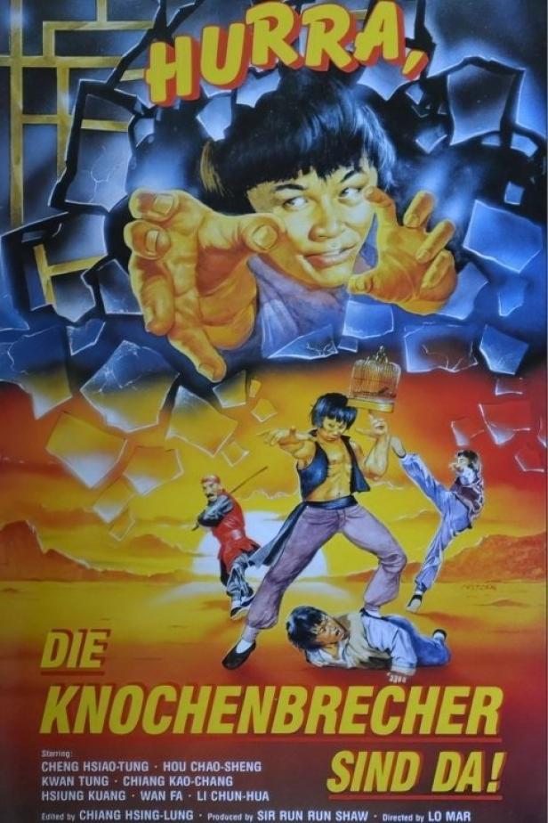 Das Filmplakat für „Die Knochenbrecher sind da!“ zeigt asiatische Kampfkünstler in Aktion.