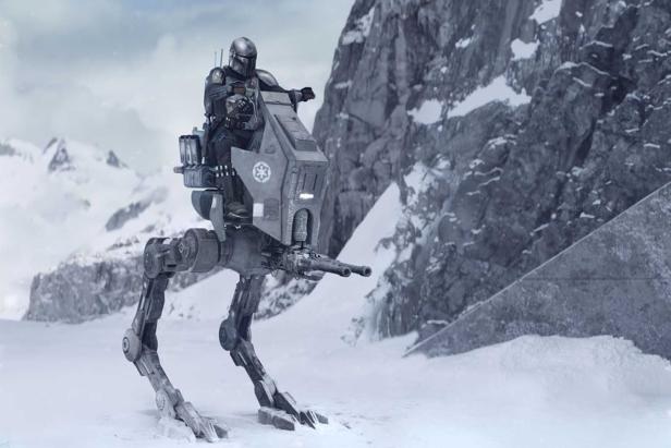Ein gepanzerter Mandalorianer sitzt auf einem AT-ST-Läufer in einer verschneiten Berglandschaft.
