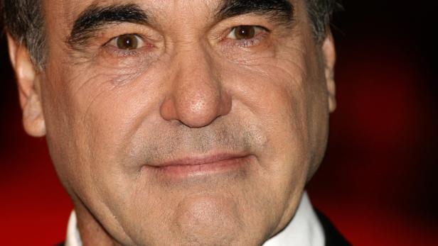 Director Oliver Stone arrives for the premiere of