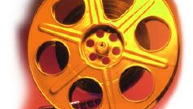 Eine goldene Filmrolle mit einem Stück Filmband.