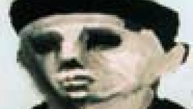 Nahaufnahme eines Mannes mit dunkler Mütze.