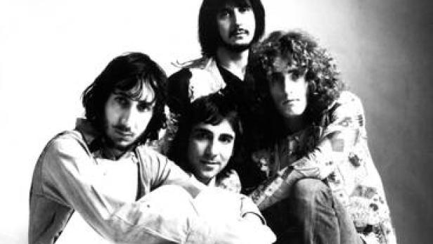 Die Band The Who posiert für ein Schwarzweißfoto.