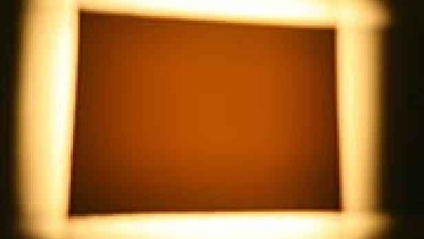 Ein rechteckiger, orangefarbener Bereich ist von einem hellen, unscharfen Rahmen umgeben.