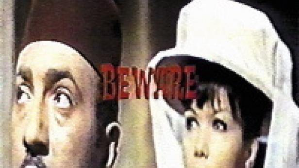 Ein Mann mit Fez und eine Frau mit Haube blicken erschrocken zur Seite.