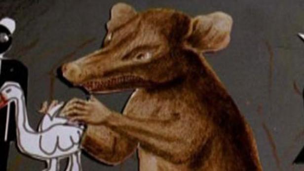 Ein Bär, eine Figur im Smoking und eine Figur mit Hörnern sind zu sehen.