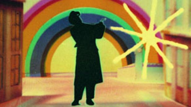 Eine stilisierte Silhouette einer Person steht vor einem Regenbogen und einer stilisierten Sonne.