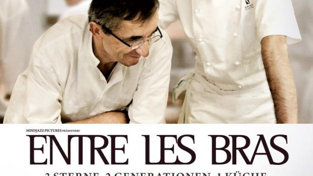 Das Filmplakat zu „Entre les Bras“ zeigt zwei Köche in einer Restaurantküche.