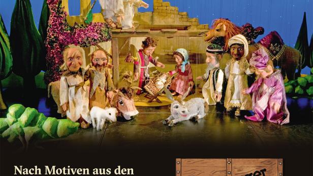 Das Poster für „Die Weihnachtsgeschichte“ der Augsburger Puppenkiste zeigt eine Puppenspielszene.