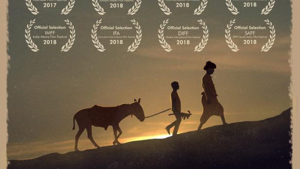Ein Mann und ein Junge führen einen Esel in einer staubigen Landschaft; Filmposter für „Bhasmasur“.
