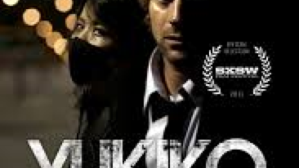 Das Filmplakat für „Yukiko“ zeigt die beiden Hauptdarsteller vor dunklem Hintergrund.