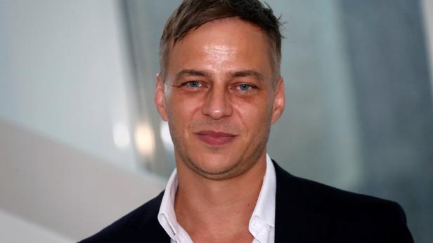 Tom Wlaschiha poses during a photocall for the television series "Das Boot" during the annual MIPCOM television programme market in Cannes