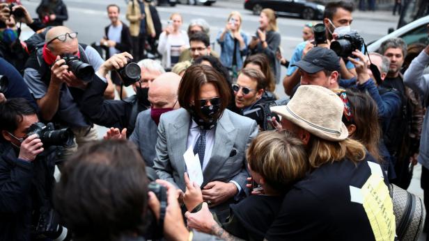Actors Johnny Depp and Amber Heard at the High Court in London