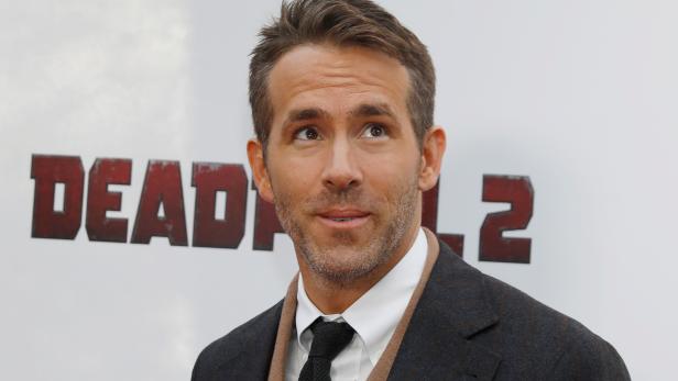 FILE PHOTO: Actor Ryan Reynolds poses on the red carpet during the premiere of "Deadpool 2" in Manhattan, New York
