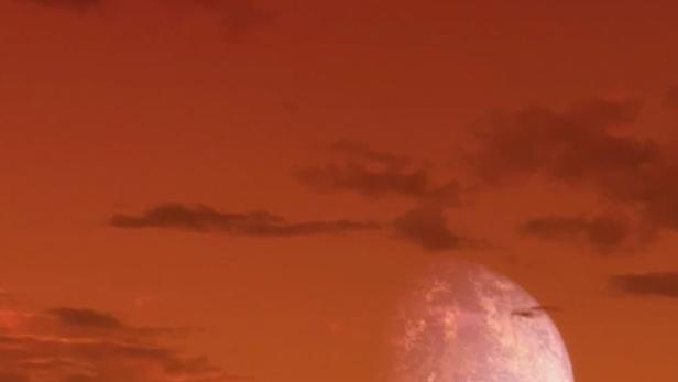 Das Filmplakat für „The Hunt for Planet B“ zeigt einen Planeten vor einem orangefarbenen Himmel.