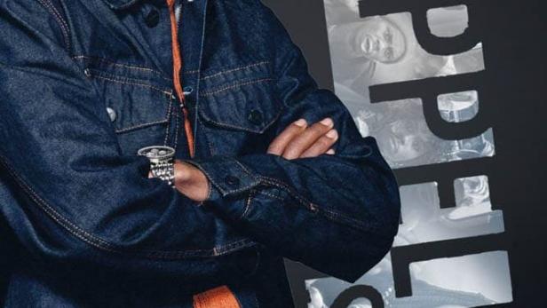 Dave Chappelle vor dem Hintergrund des Schriftzugs „Chappelle’s Show“.