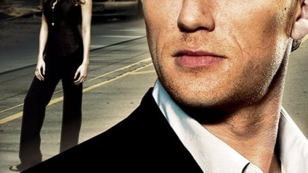 Ein Mann und eine Frau auf dem Filmplakat für die Fernsehserie „Journeyman“.