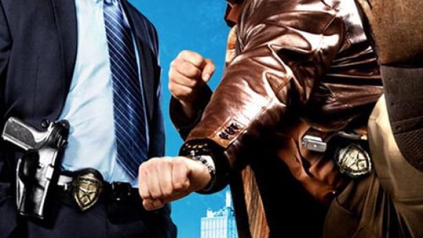 Das Filmplakat für „The Good Guys“ zeigt zwei ungleiche Polizisten vor einer Skyline.
