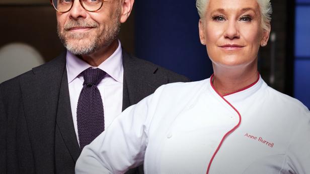 Das Poster für „Worst Cooks in America“ zeigt Anne Burrell und einen Mann im Anzug.