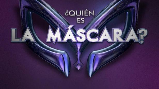 Das Logo der Fernsehsendung „¿Quién es la Máscara?“ vor einem violetten Hintergrund.