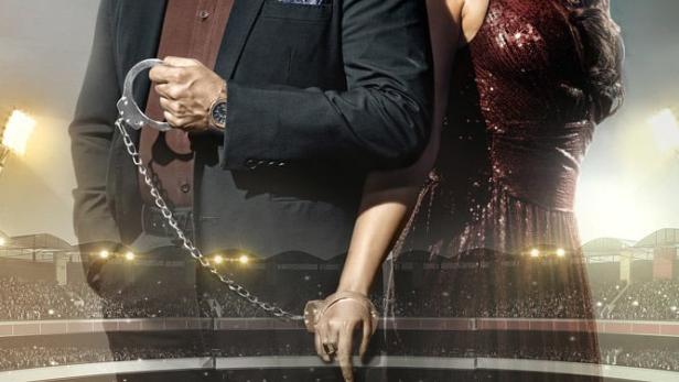 Ein Mann und eine Frau, durch Handschellen verbunden, auf dem Poster für „Inside Edge“.