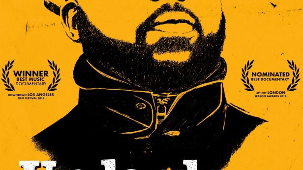 Das Filmplakat für „Underdogs“ zeigt eine stilisierte Zeichnung eines Mannes mit Brille vor einem gelben Hintergrund.