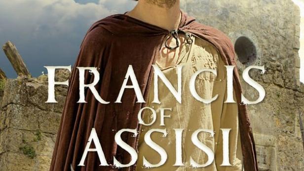 Das Filmplakat für „Franz von Assisi“ zeigt den Heiligen vor einer mittelalterlichen Kulisse mit Rittern.