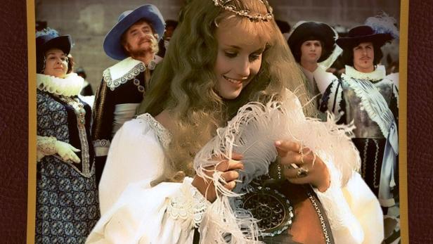 Das Filmplakat für „Wie man Prinzessinnen weckt“ zeigt eine junge Frau mit einer Laute.