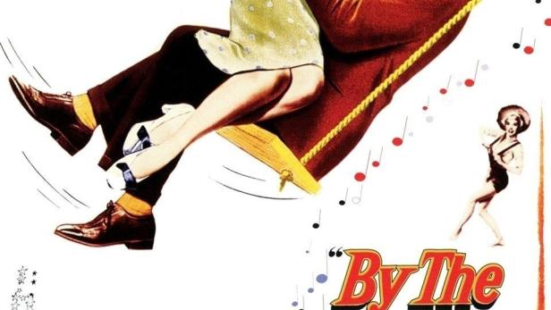 Das Filmplakat für „By The Light of The Silvery Moon“ zeigt ein Paar auf einer Schaukel vor einem Mond.