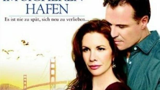Das Cover des Films „Im sicheren Hafen“ von Danielle Steel zeigt ein Paar vor der Golden Gate Bridge.