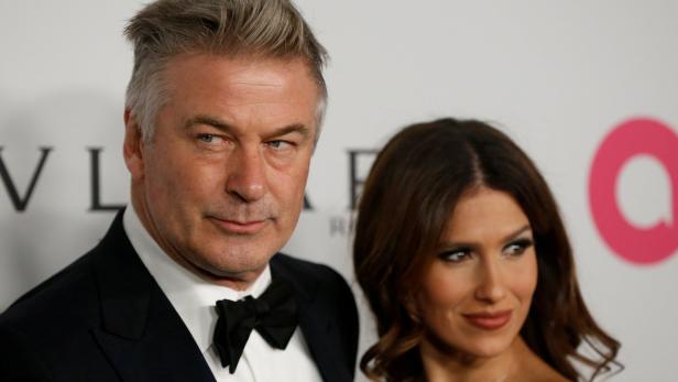 FILE PHOTO: Actor Alec Baldwin and his wife Hilaria Baldwin pose on the red carpet during the commemoration of the Elton John AIDS Foundation 25th year fall gala at the Cathedral of St. John the Divine in New York City