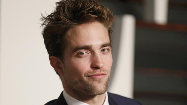 Actor Robert Pattinson arrives at the 2015 Vanity