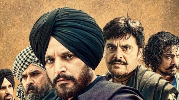 Das Filmplakat für „Shareek“ zeigt eine Gruppe ernster Männer mit Turbanen.