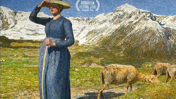 Das Filmplakat für „Segantini: Ritorno alla Natura“ zeigt eine Frau mit Schafen in den Bergen.