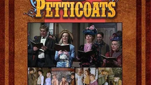 Das Cover der DVD „Pistolen und Petticoats“ zeigt eine Gruppe von Menschen, die singen.