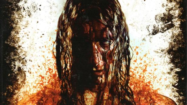 Das Cover des Films „Adam Chaplin: Uncut Edition“ zeigt einen blutverschmierten Mann.