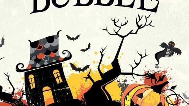 Ein Junge in einer Blase vor einer Halloween-Kulisse mit Kürbis, Fledermäusen und einem Spukhaus.