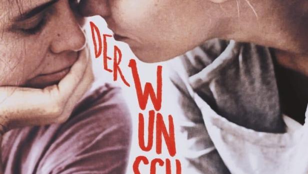Das Filmplakat für „Der Wunsch“ zeigt zwei Frauen, deren Gesichter sich berühren.