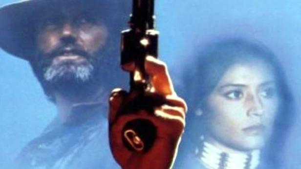 Das Filmplakat für „Hawken's Breed“ zeigt einen Mann mit Gewehr und eine Frau im Hintergrund.