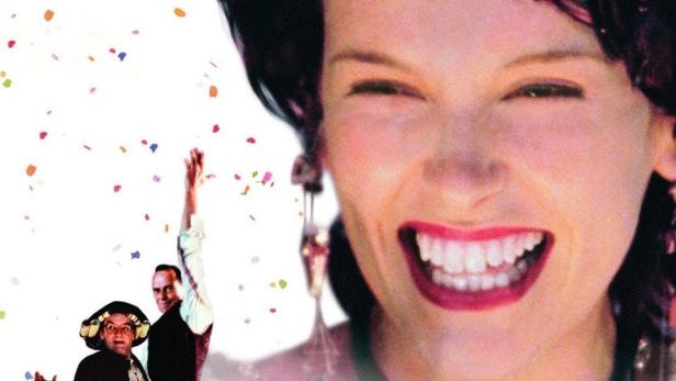 Das Filmplakat für „Cosi“ zeigt eine lachende Frau und drei weitere Schauspieler im Hintergrund.