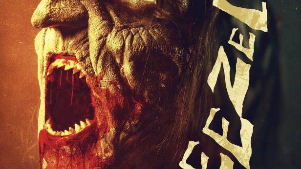 Das Filmplakat für „Beelzebub“ zeigt ein dämonisches Gesicht mit aufgerissenem Mund und Blutspuren.