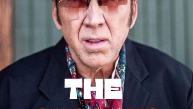 Nicolas Cage mit Hut und Sonnenbrille, möglicherweise eine Filmaufnahme für „The Gunslingers“.