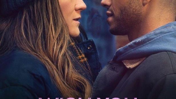 Ein Mann und eine Frau stehen einander gegenüber, möglicherweise ein Filmplakat für „Wish You Were Here“.