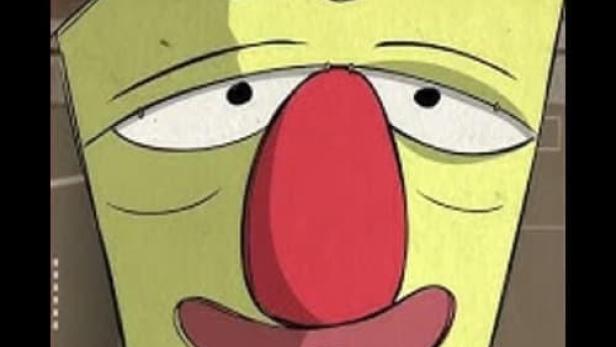 Das Gesicht eines grünen Charakters mit roter Nase und müden Augen.