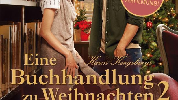 Das Filmplakat für „Eine Buchhandlung zu Weihnachten 2“ mit Katie Findlay und Wyatt Nash vor einem Weihnachtsbaum.